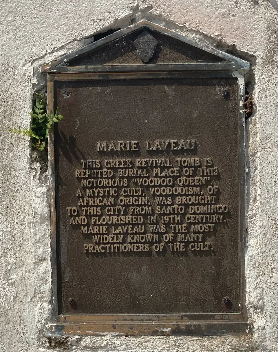 Iron memorial plaque on tomb of Marie Laveau